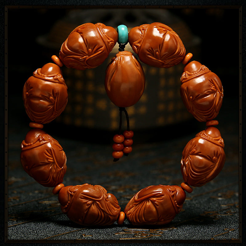 Olive Kernel Bracelet: Eight Treasures and the God of Wealth - Oriental Treasures